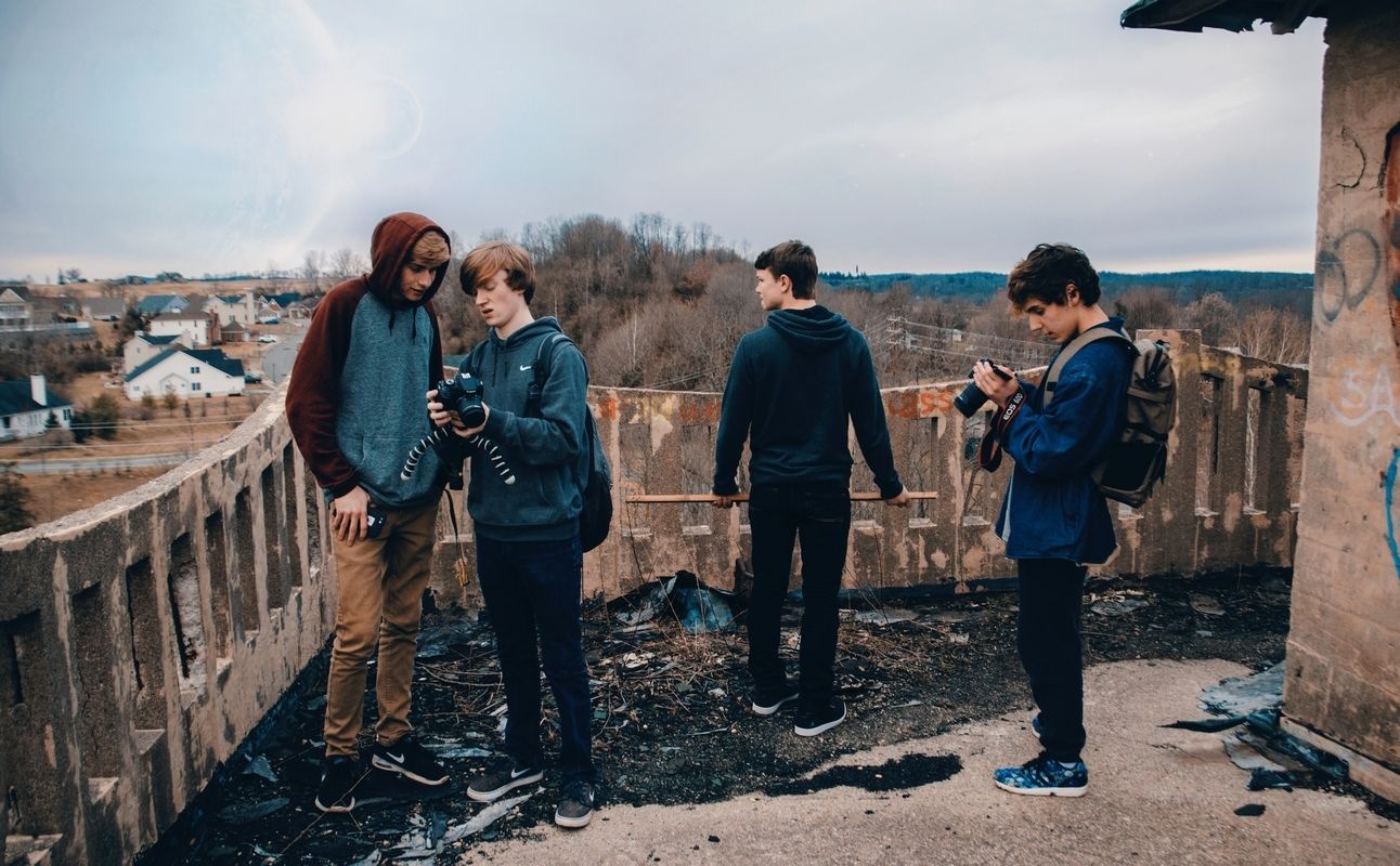 A group of teenagers exploring photography